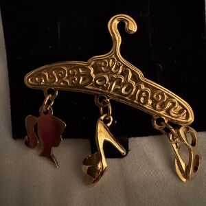 Avon Barbie Gold Hanger Brooch with Charms